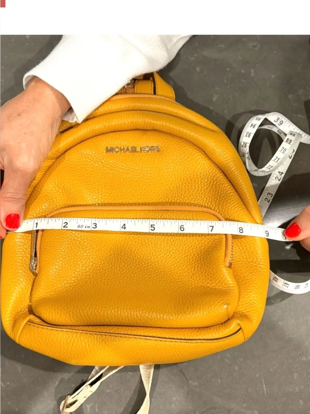 Michael Kors Mustard Yellow Pebbled Leather Mini Backpack